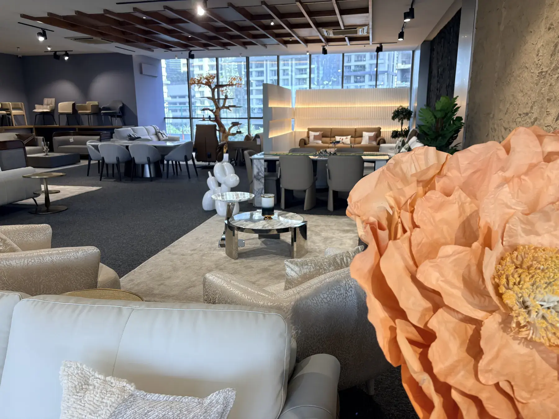 SOISU showroom — Italian sofa staged with warm accent lighting